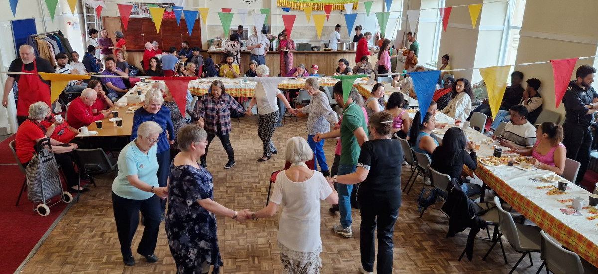 Circle dancing at our Community Meal